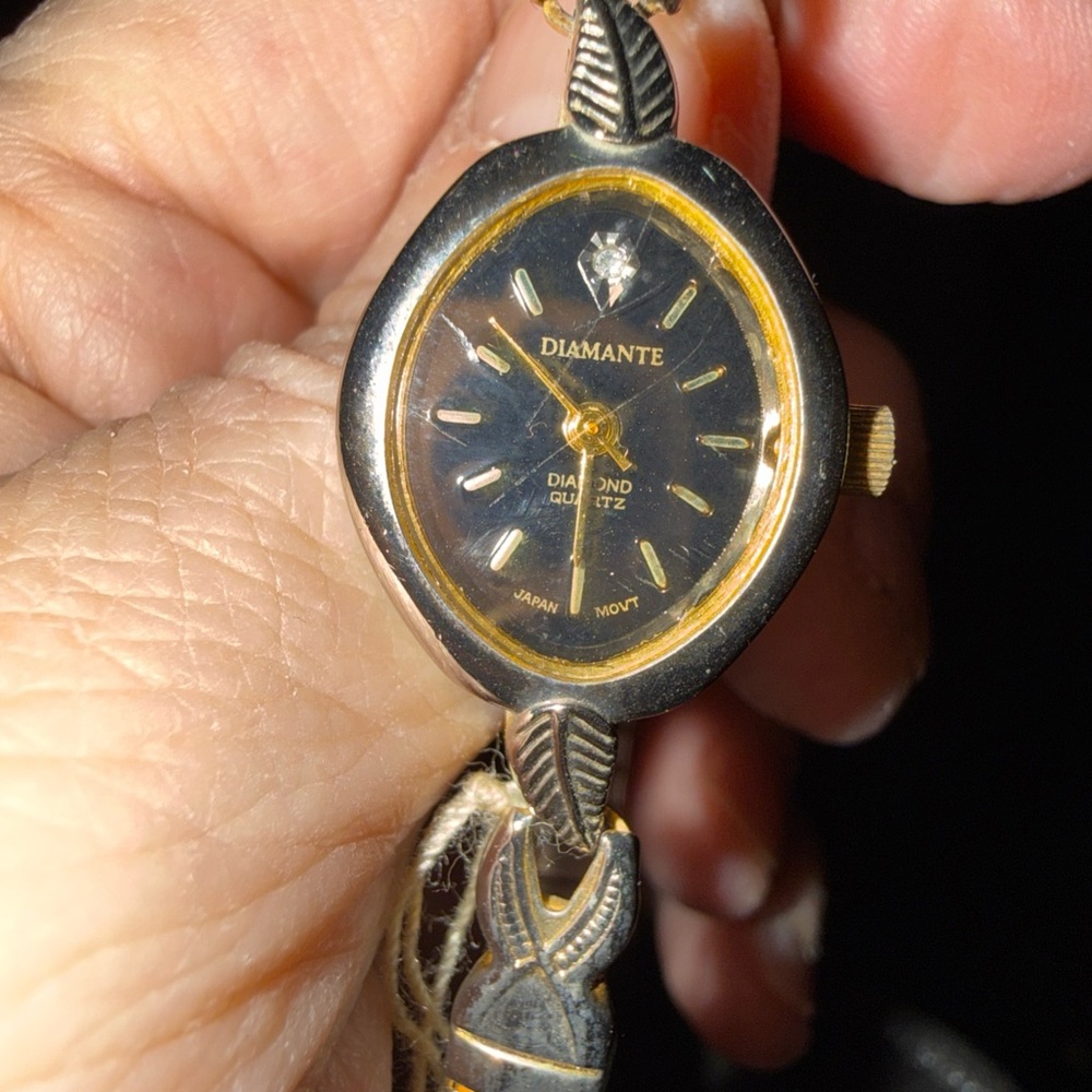 Black and Gold vintage with diamond Quartz watch